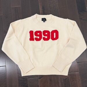 Cream Sweater with Red '1990' Design